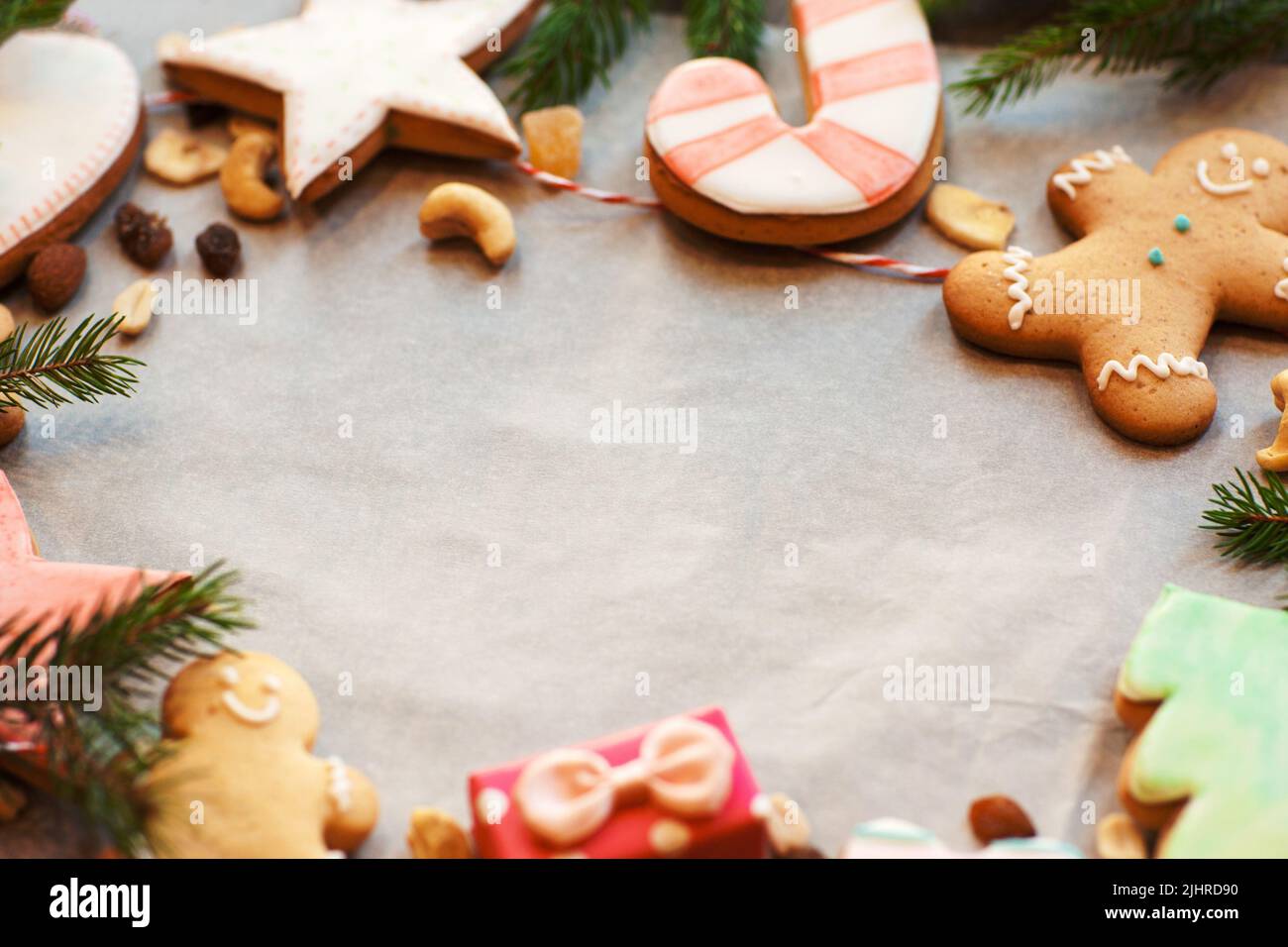 Gingerbread cookies frame on culinary parchment Stock Photo