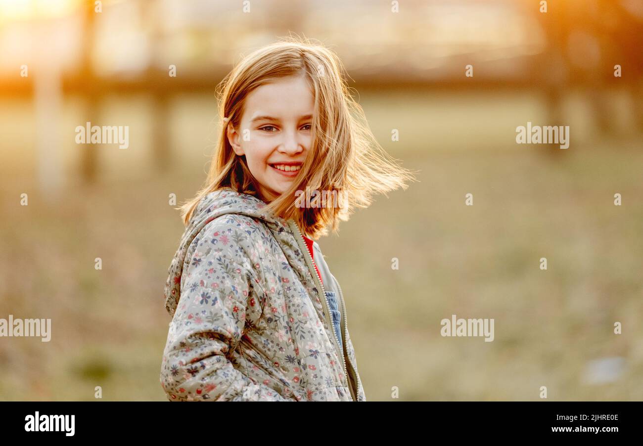 Preteen girl outdoors Stock Photo