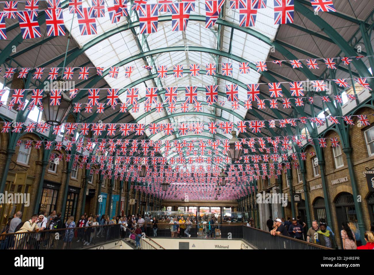 Union Jack bunting celebrating the Queens Jubilee in Londons covent garden Stock Photo