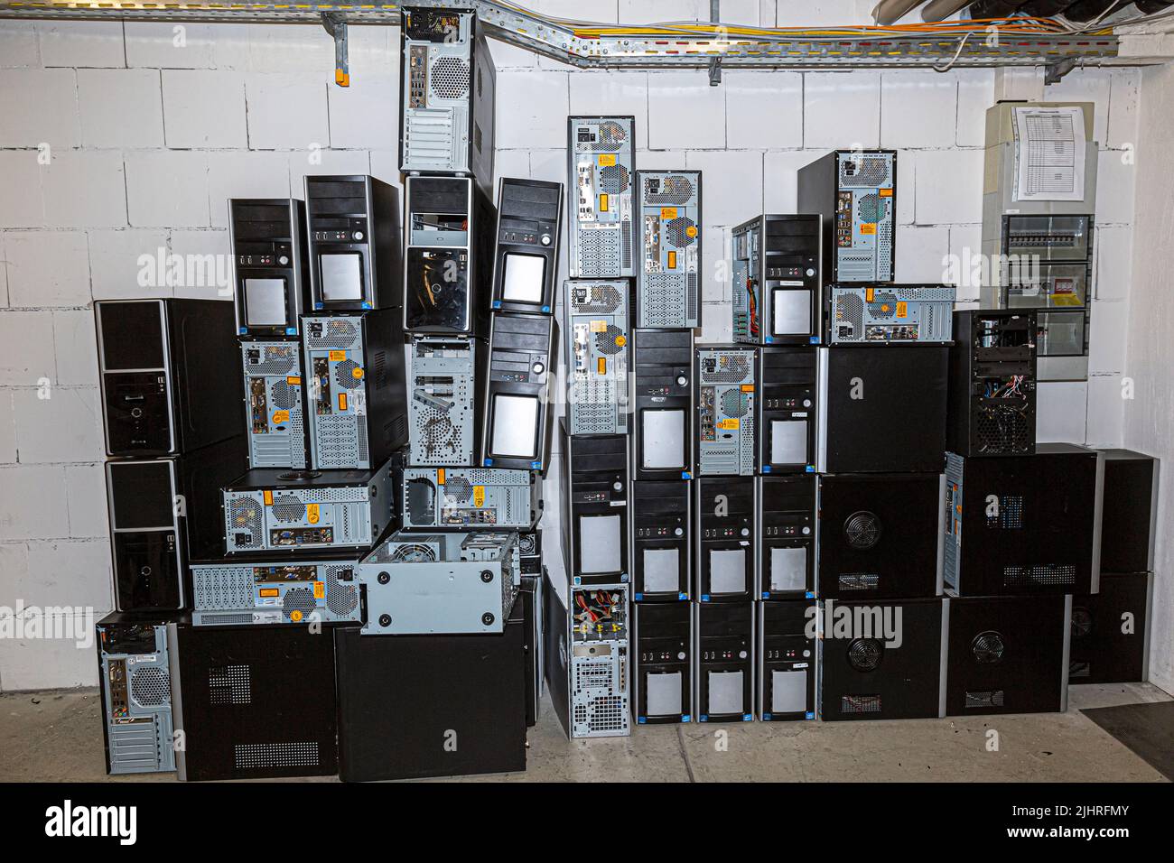 in a computer room there are many broken computers and ewaste for disposal Stock Photo Alamy