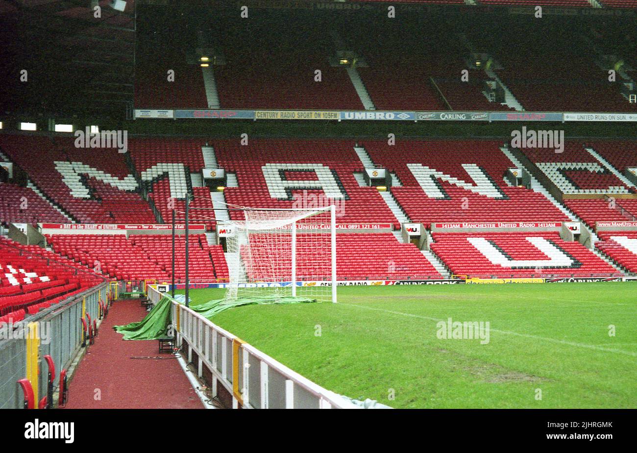 1990s, view of a corner of the pitch and the Old Trafford stadium, home of Manchester United Football Club, Manchester, England, UK. Stock Photo
