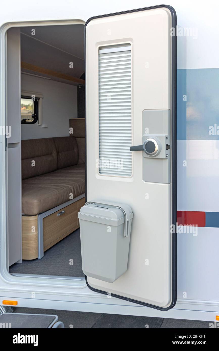 Door Mounted Trash Can With Lid Camper Van Stock Photo