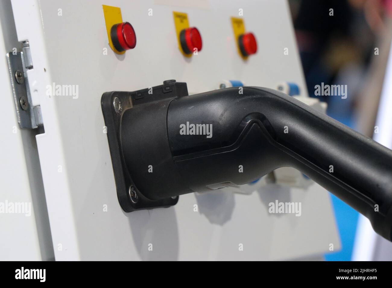 Charging panel or Charging board with the plug connected used to charge electric vehicles or environmentally friendly zero emission cars Stock Photo