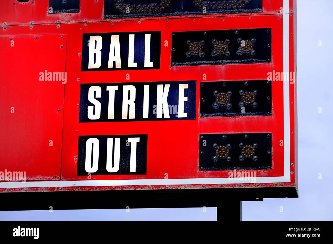 Red baseball scoreboard for keeping track of ball strike out Stock
