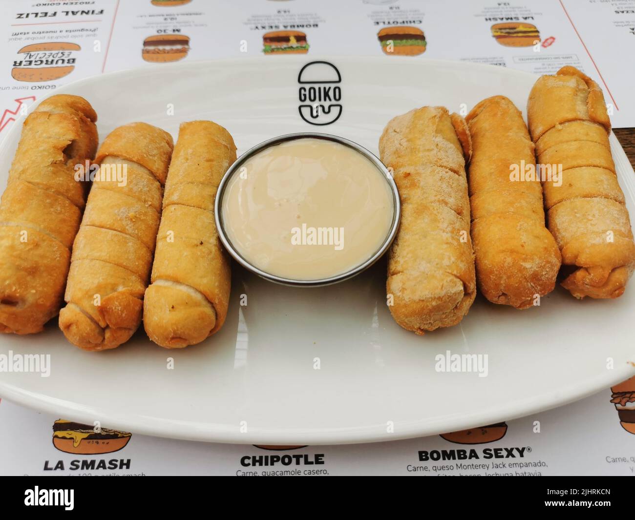 a-closeup-shot-of-a-ration-of-rolled-tequenos-stuffed-with-cheese-from