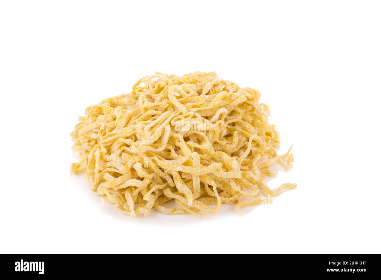 Yellow noodles drying isolated on white background Stock Photo Alamy