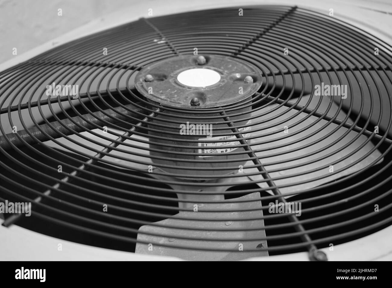 A grayscale closeup of an old industrial fan Stock Photo