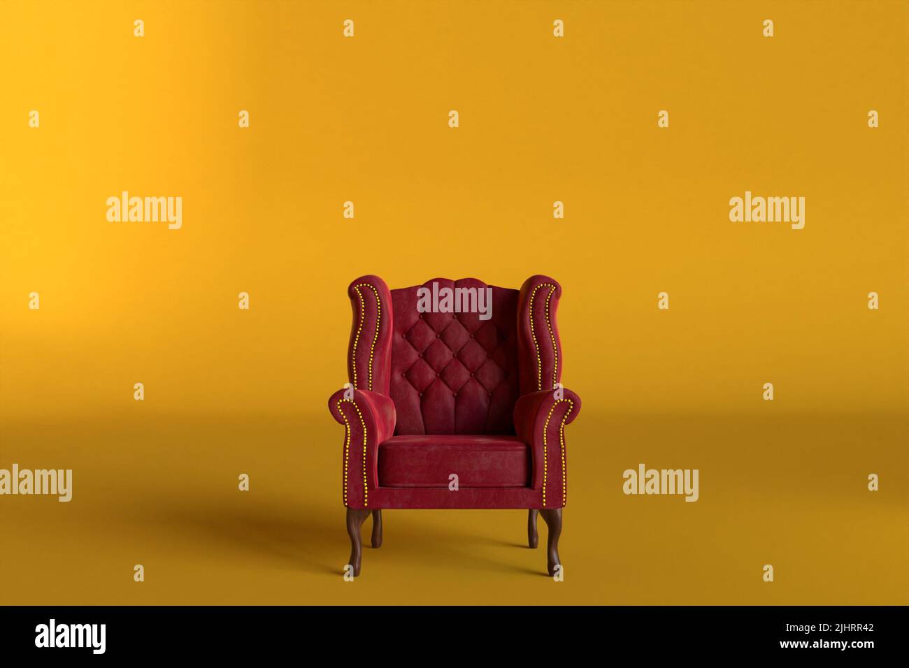 Red velvet armchair of old design on short legs with high back isolated