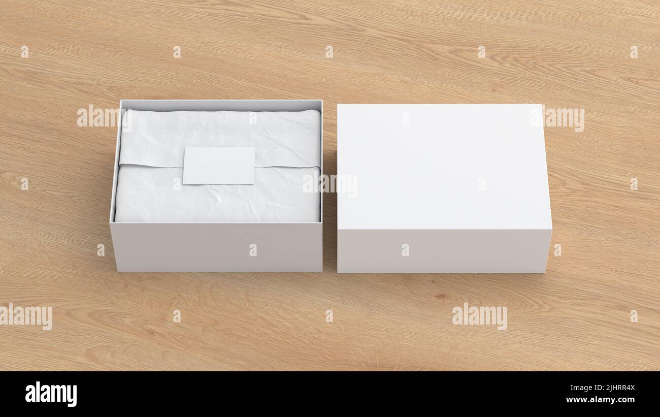 Gift box mock up with cover. White gift box with blank label or business card on wrapping paper. Wooden background. Front view. 3d illustration Stock Photo