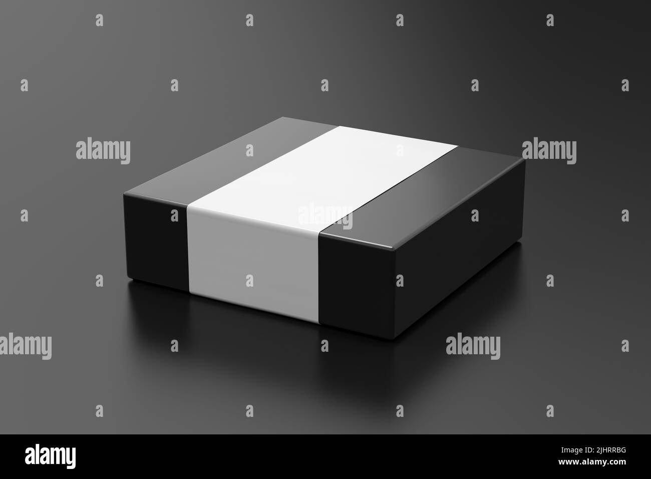 Square box mock up with blank paper cover label: Black gift box on black background. Side view Stock Photo
