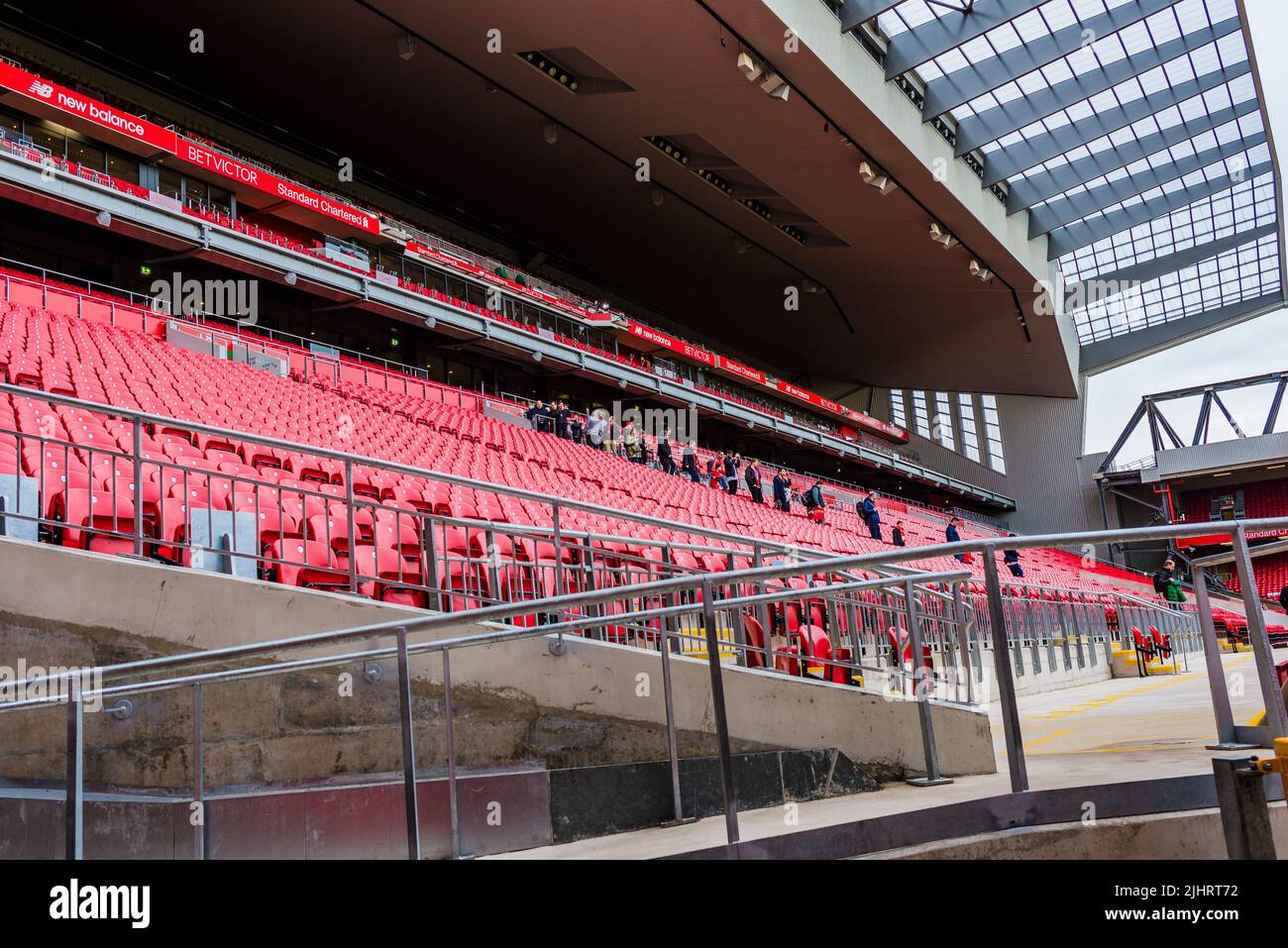 Red chairs in the Anfield stands. Anfield is a football stadium in