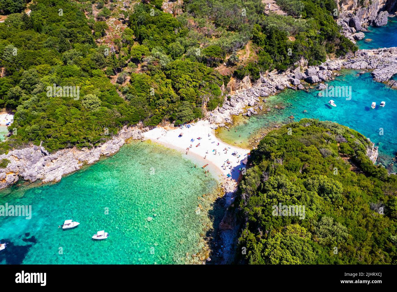 Corfu island, Greece . Aerial view of beautiful double beach with turquoise clear waters Limni beach Glyko near Paleokastritsa Stock Photo