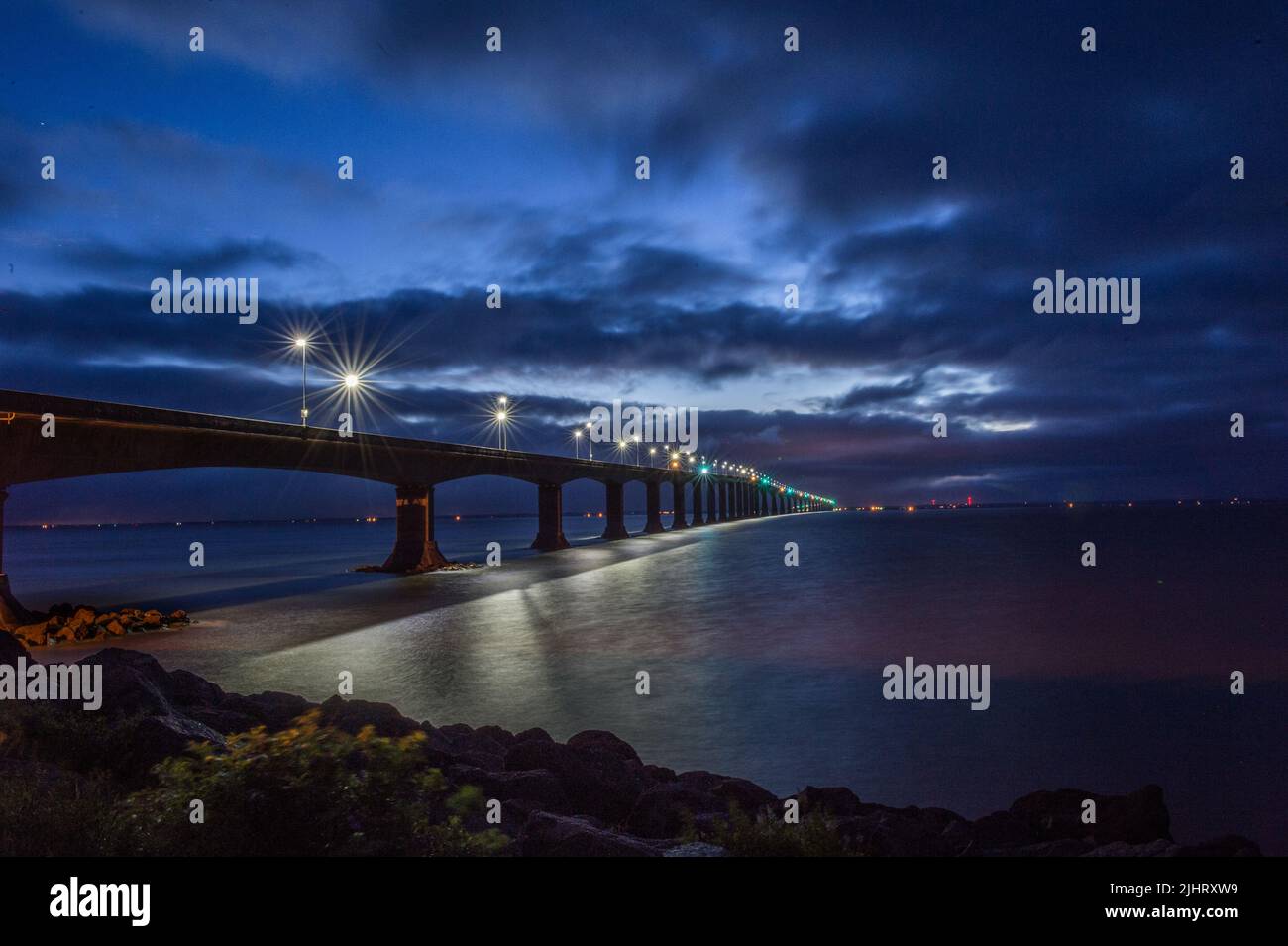 A low angle of the Confederation Bridge leading to Borden-Carleton, Cape Jourimain, Canada Stock Photo