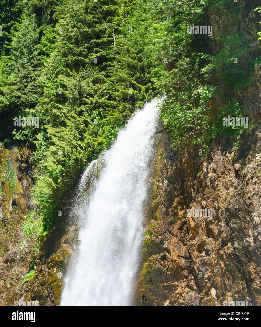Whitewater rushes over the top of Franklin Falls in Washington State. Stock Photo