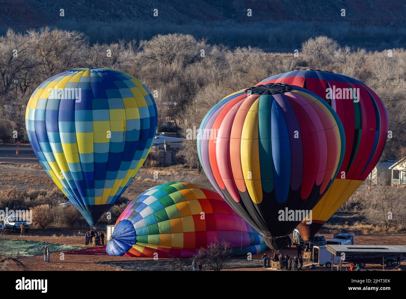 Several hot air balloons inflating in Bluff, Utah Stock Photo