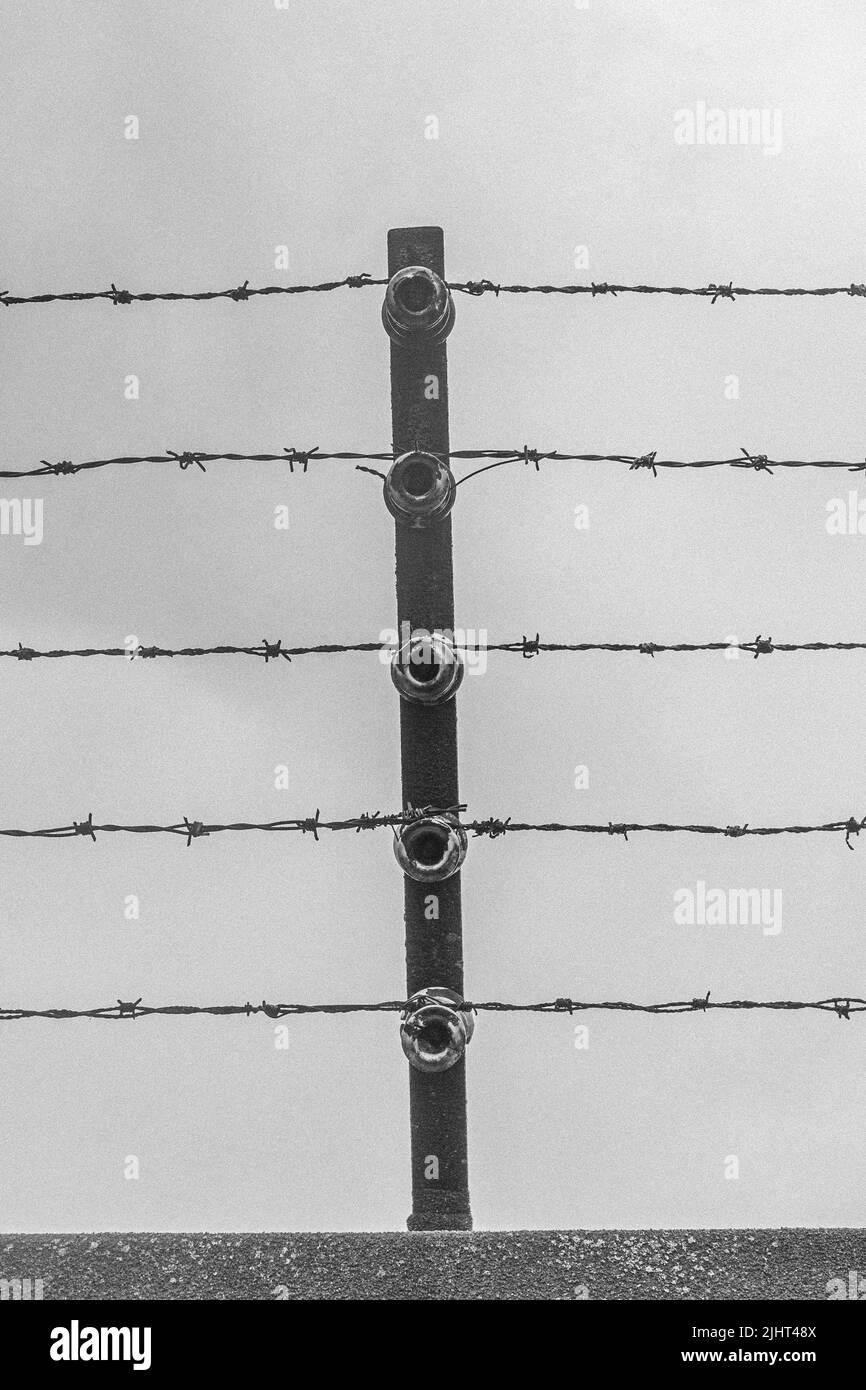 Barbed wire at Mauthausen concentration camp Stock Photo