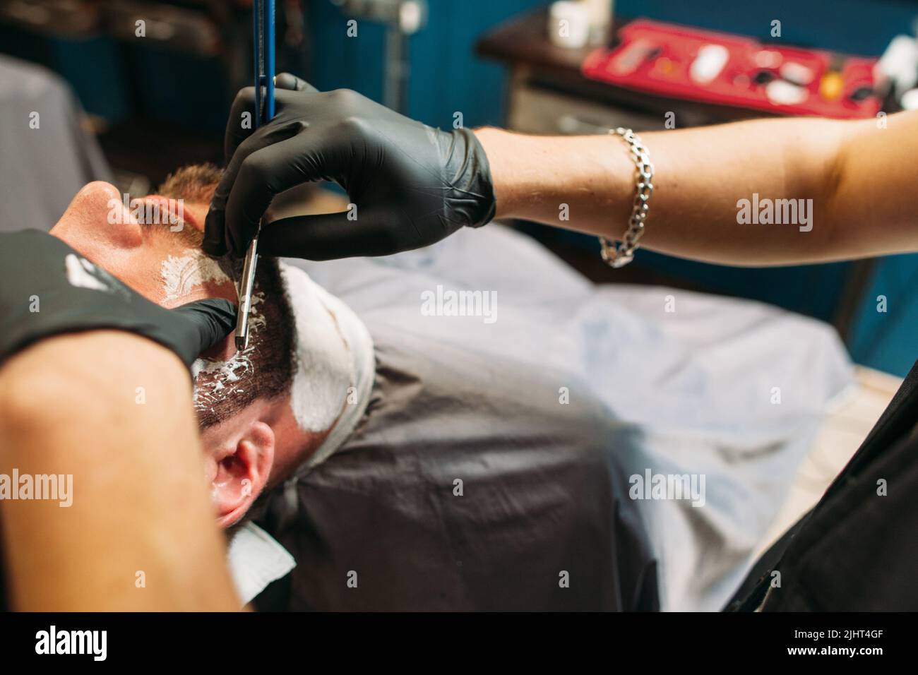 Shaving man at barbershop closeup free space Stock Photo