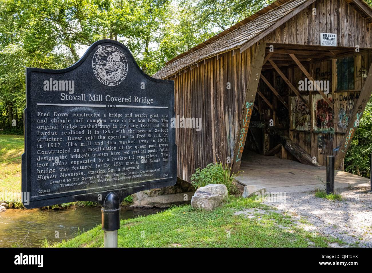 The 1895 Stovall Mill Covered Bridge in Sautee Nacoochee (which replaced a bridge washed away by flood) is the shortest covered bridge in Georgia. Stock Photo