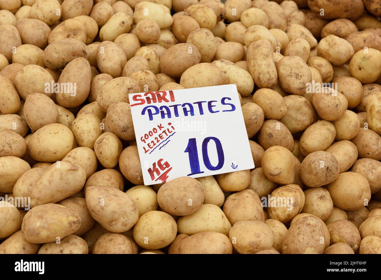 ISTANBUL, TURKEY JULY 3, 2022 Yellow potatoes and price tag on the