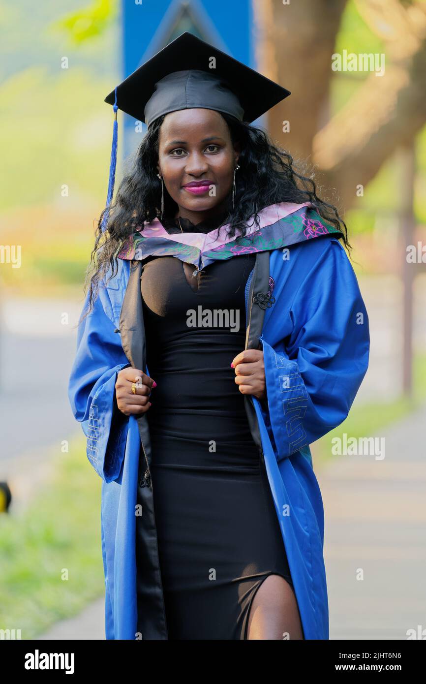 A vertical shot of an African girl graduating from university in ...
