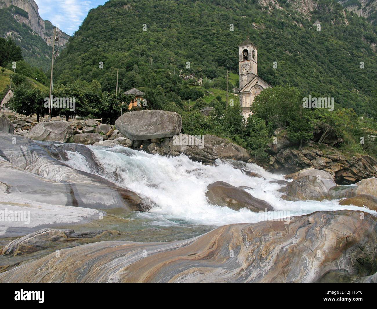 Church in the mountains next to the Verzasca river in the Verzasca ...