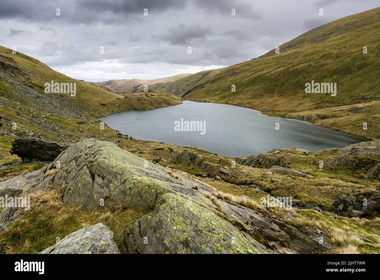 Small Water Tarn from Nan Bield Pass below Harter Fell in the Lake District National Park, Cumbria, England. Stock Photo