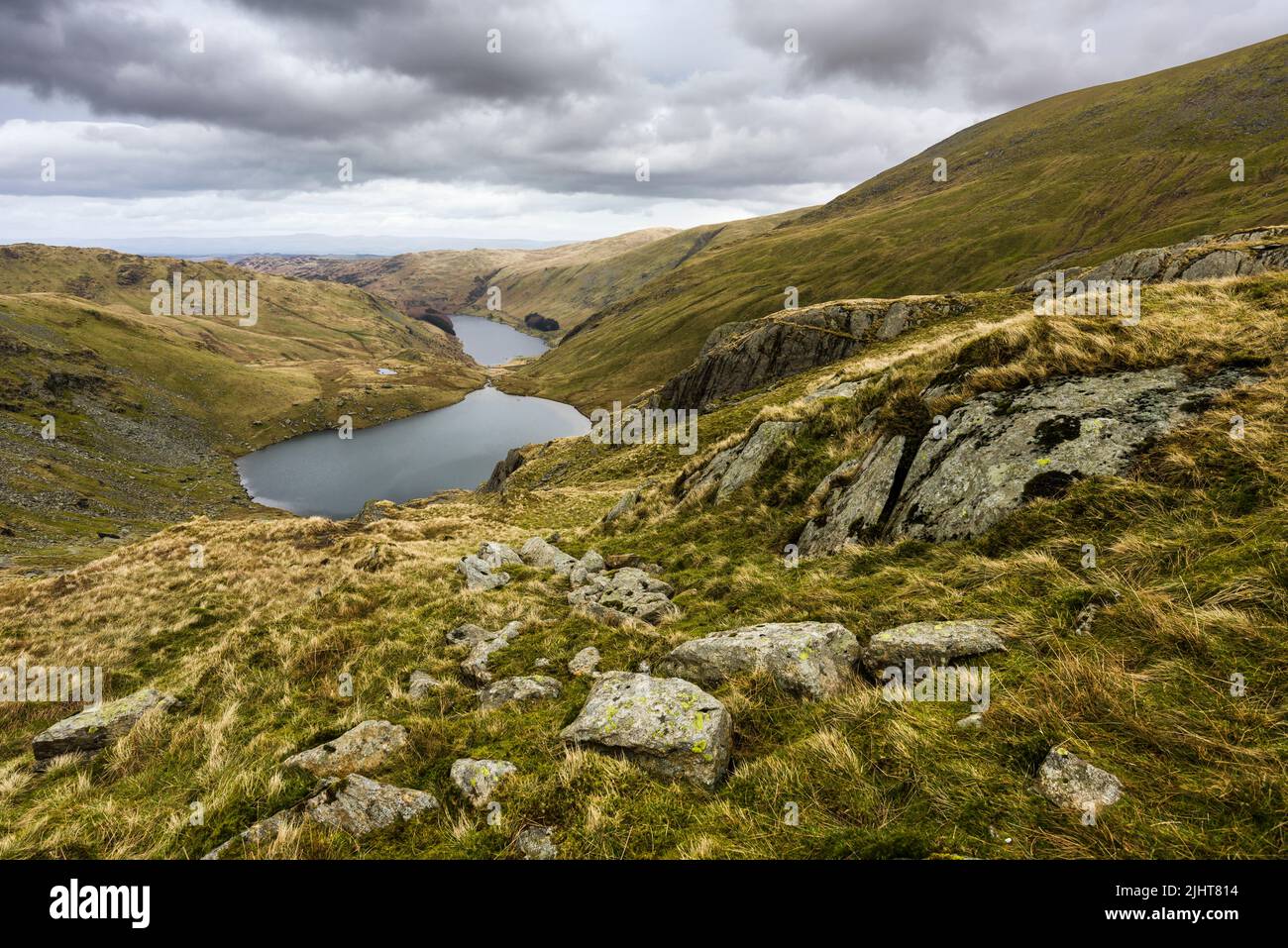Small Water Tarn and Haweswater Reservoir from Nan Bield Pass below Harter Fell in the Lake District National Park, Cumbria, England. Stock Photo