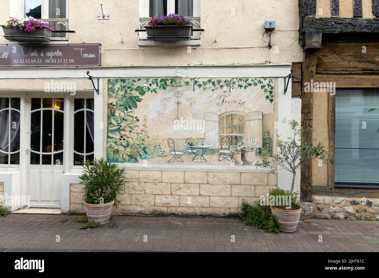 Courtyard mural in the old town of Le Petit-Andely in Les Andelys Stock Photo