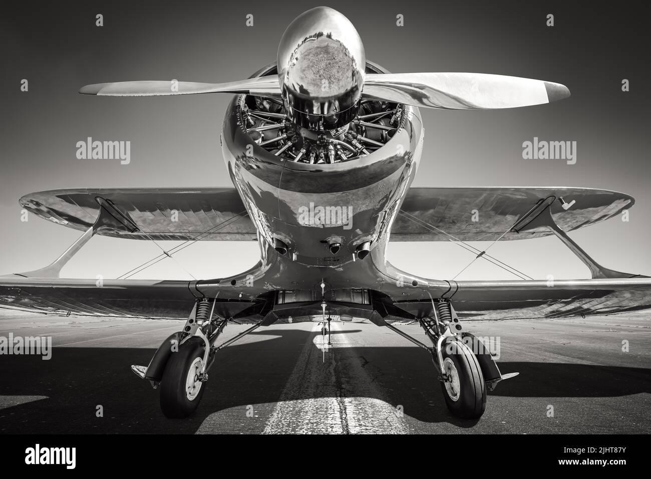 historical biplane on a runway ready for take off Stock Photo