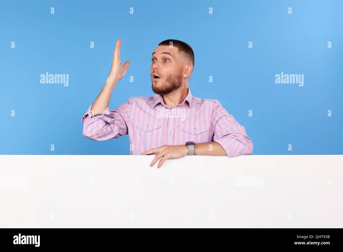 cheerful man holding board with empty copy space Stock Photo