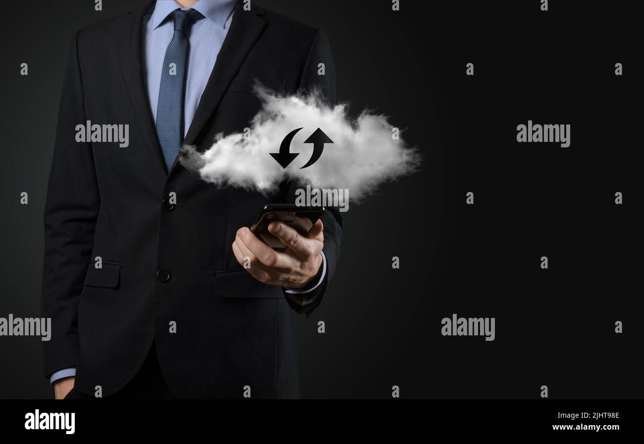 Cloud technology. Polygonal wireframe cloud storage sign with two arrows up and down on dark . Cloud computing, big data center, future infrastructure Stock Photo