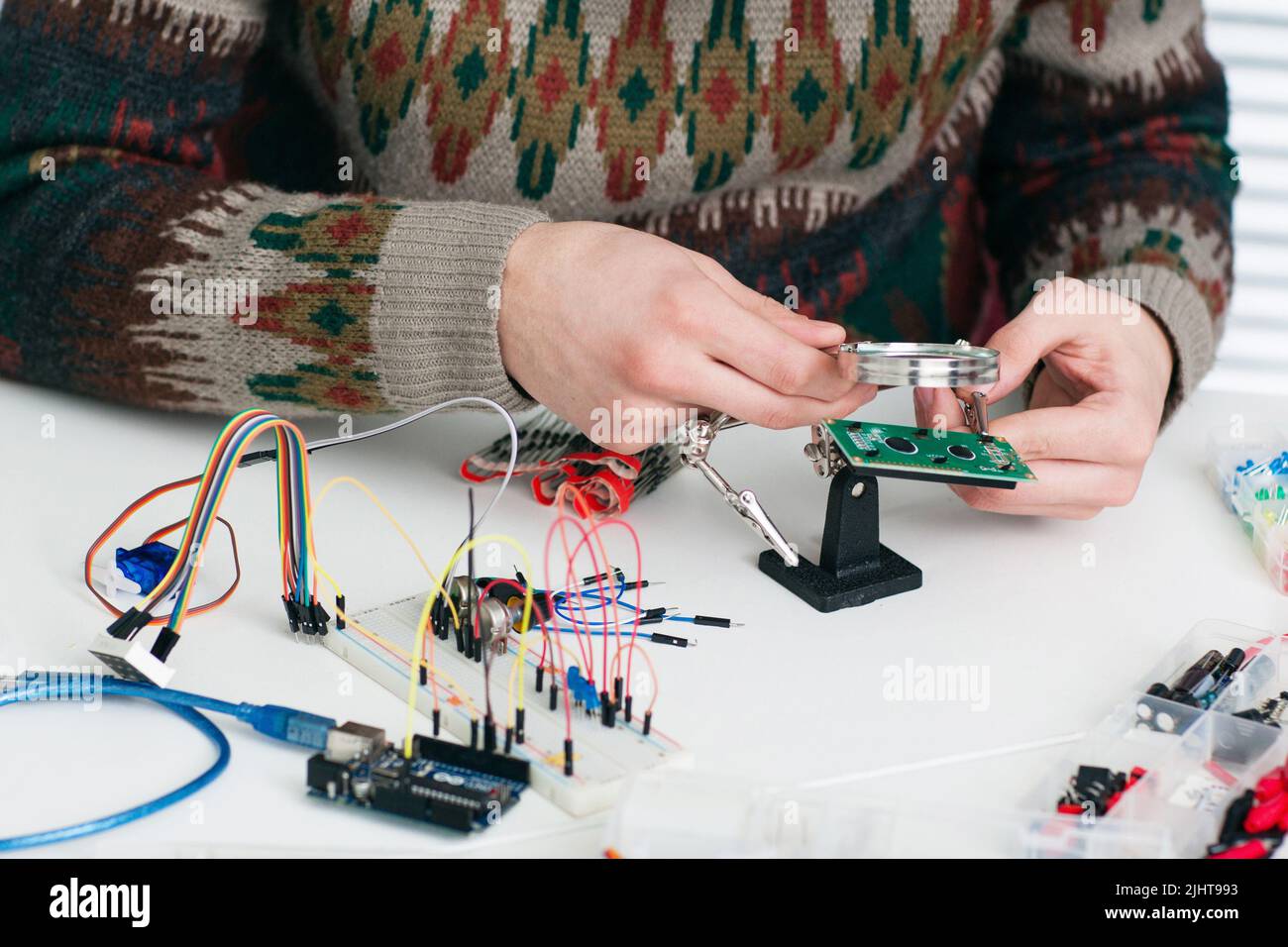 Inspecting new electronic component free space Stock Photo - Alamy