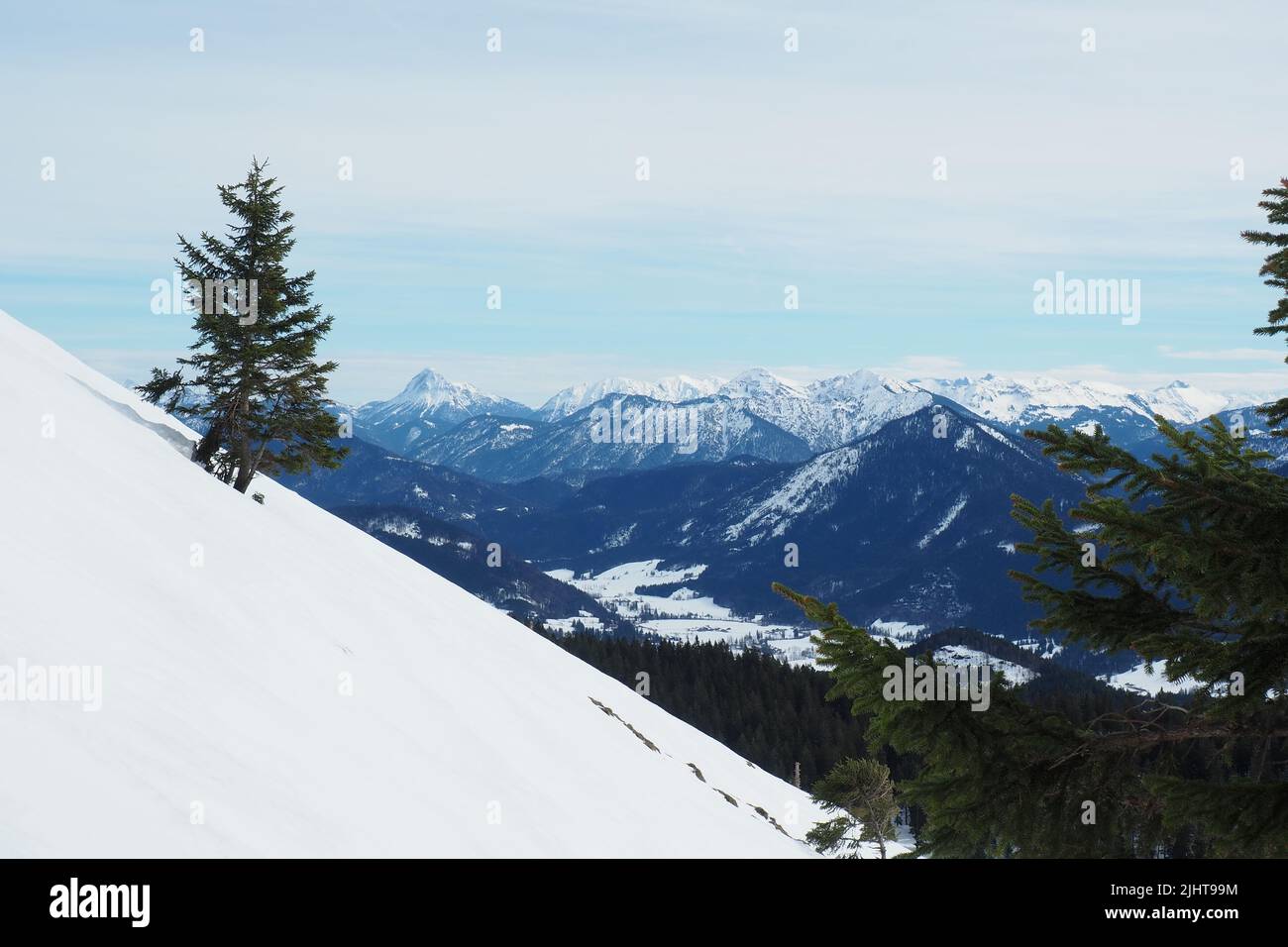 Beautiful Jochberg mountain range in Germany with snowy edges Stock Photo