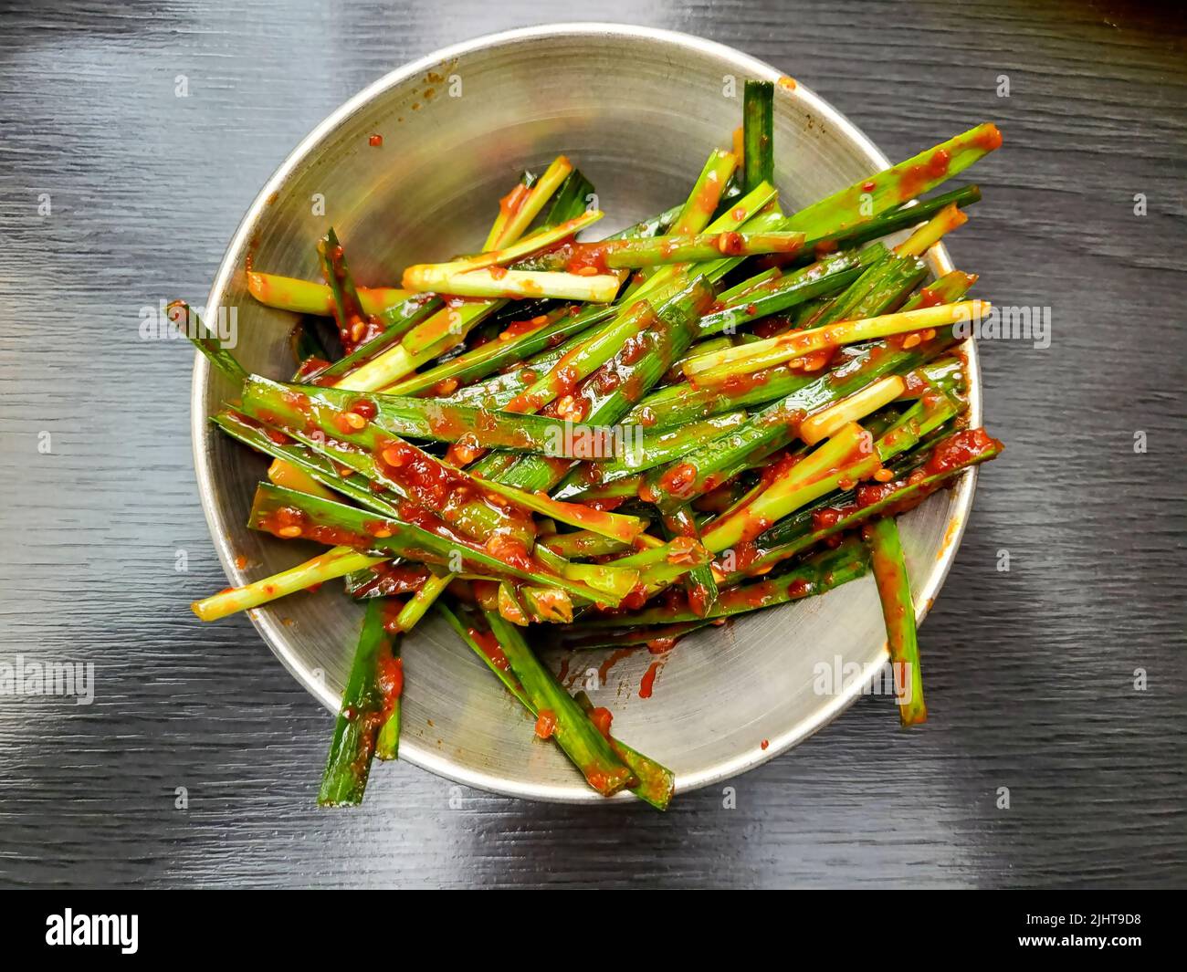 A top view of seasoned green onion on the table Stock Photo - Alamy