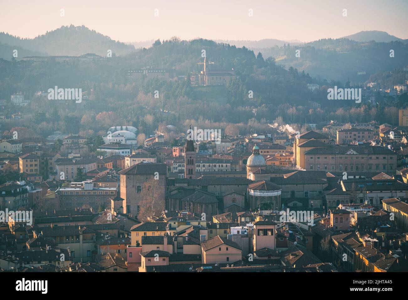 Bird'seye view of the colorful rooftops of Bologna, Italy nestled in