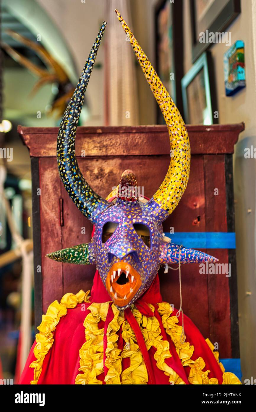 A vertical shot of a traditional Puerto Rican Vejigante mask Stock