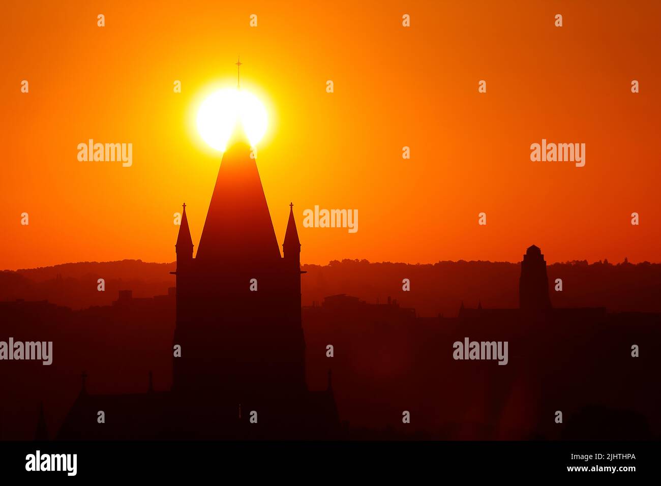 The sun rising behind St Bartholomews Church in Wortley,Leeds,West Yorkshire Stock Photo
