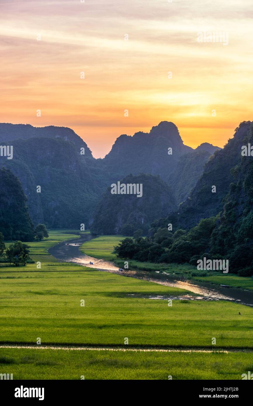 Majestic View Of Tam Coc Valley With Ngo Dong River Flowing Amid Rice  Paddies In Ninh Binh Vietnam High-Res Stock Photo - Getty Images