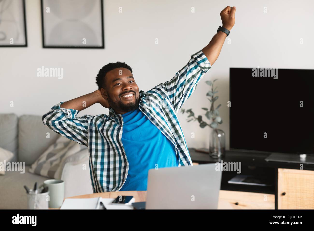 Man stretching arms african hi-res stock photography and images - Alamy