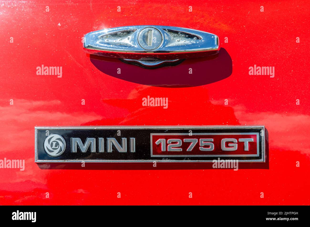 Close up view of a Mini 1275 GT badge at The Berkshire Motor Show in Reading, UK Stock Photo