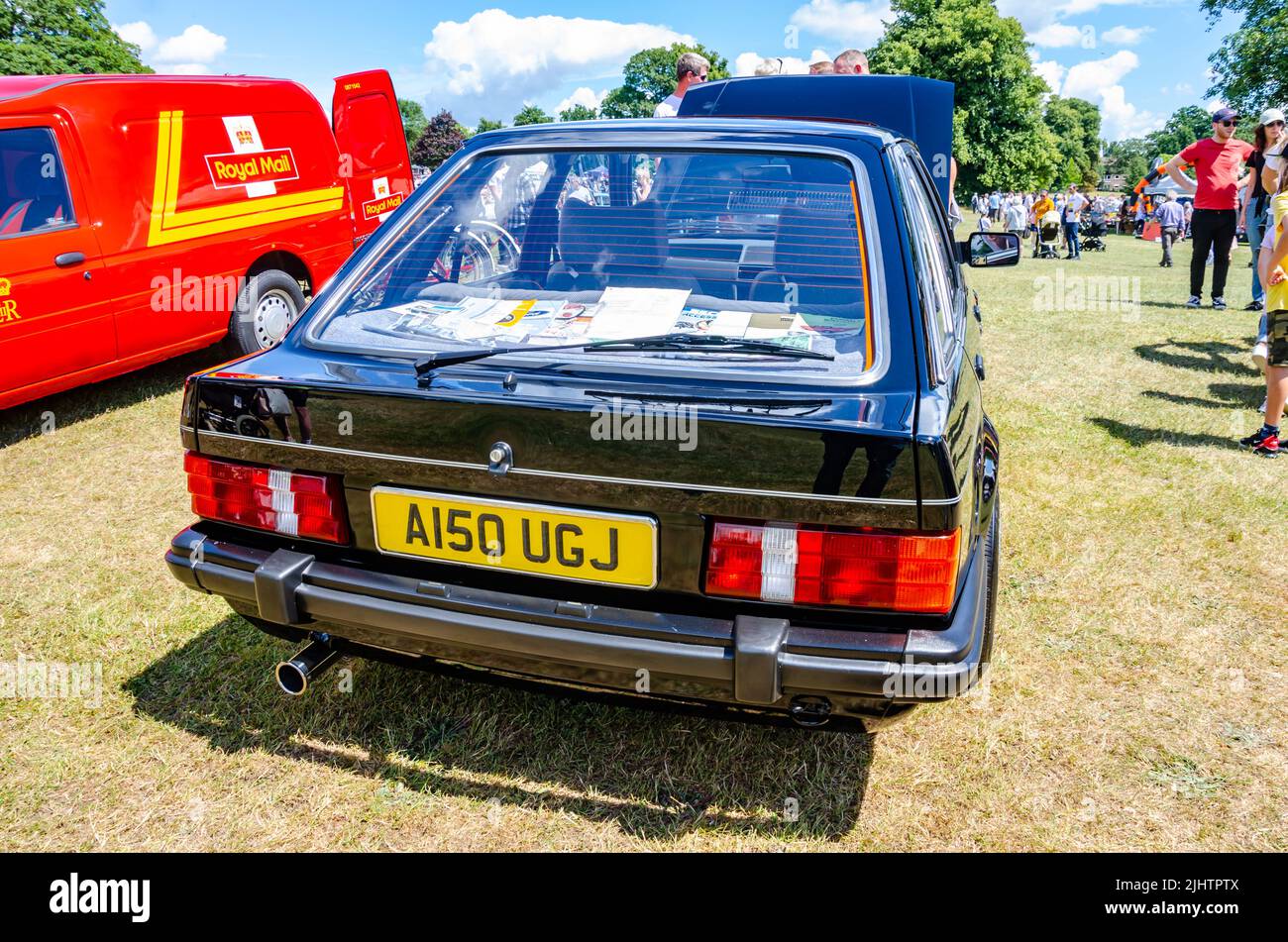 Rear view of a 1983 Ford Escort in black at The Berkshire Motor Show in Reading, UK Stock Photo