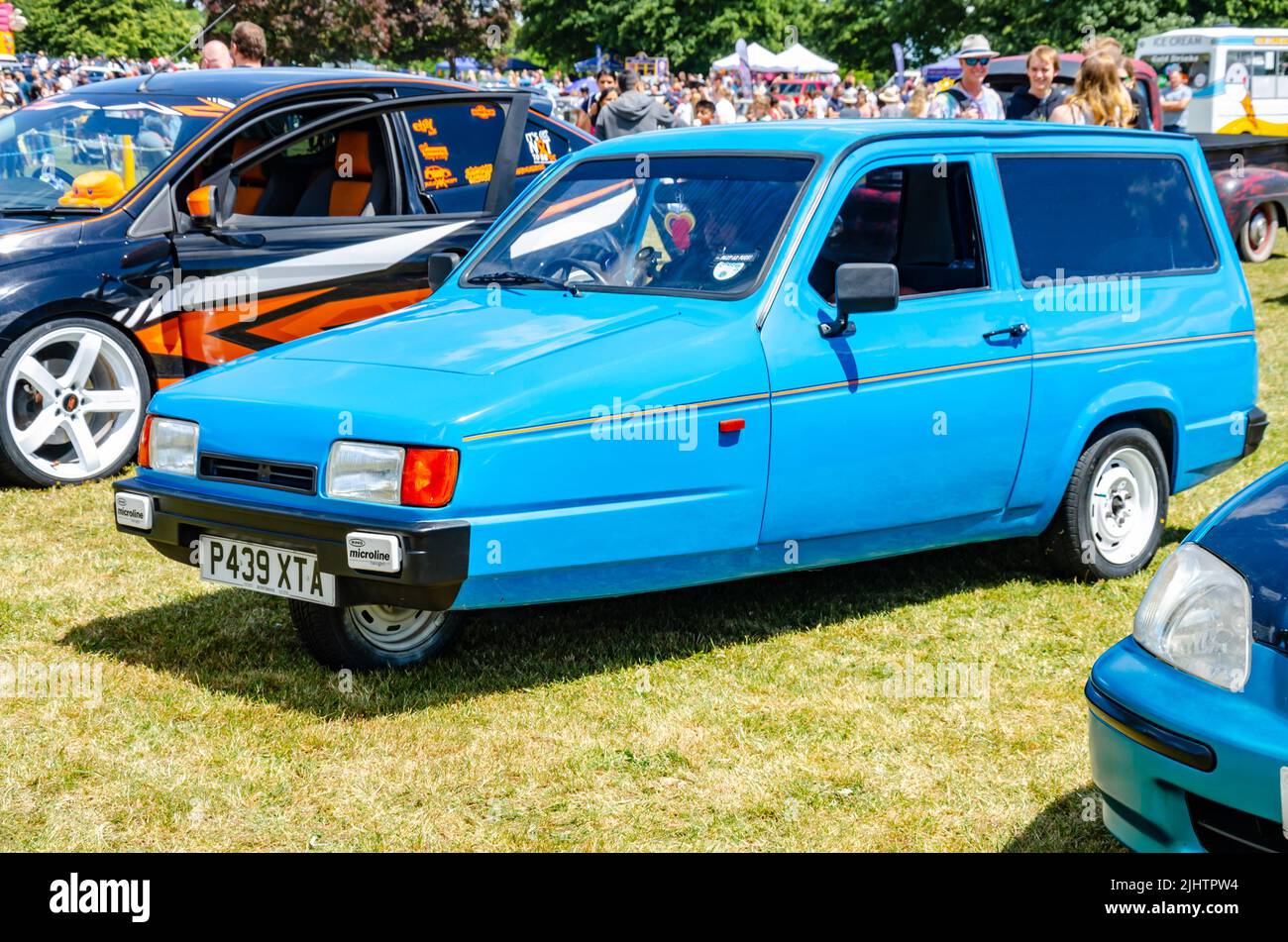 A 1996 Reliant Robin three wheeler car in blue at The Berkshire Motor Show in Reading, UK Stock Photo