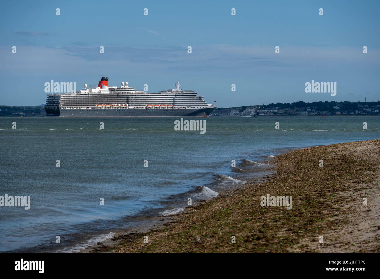 Cunard’s ‘Queen Victoria’ sailing past Calshot after leaving Southampton Docks. Stock Photo