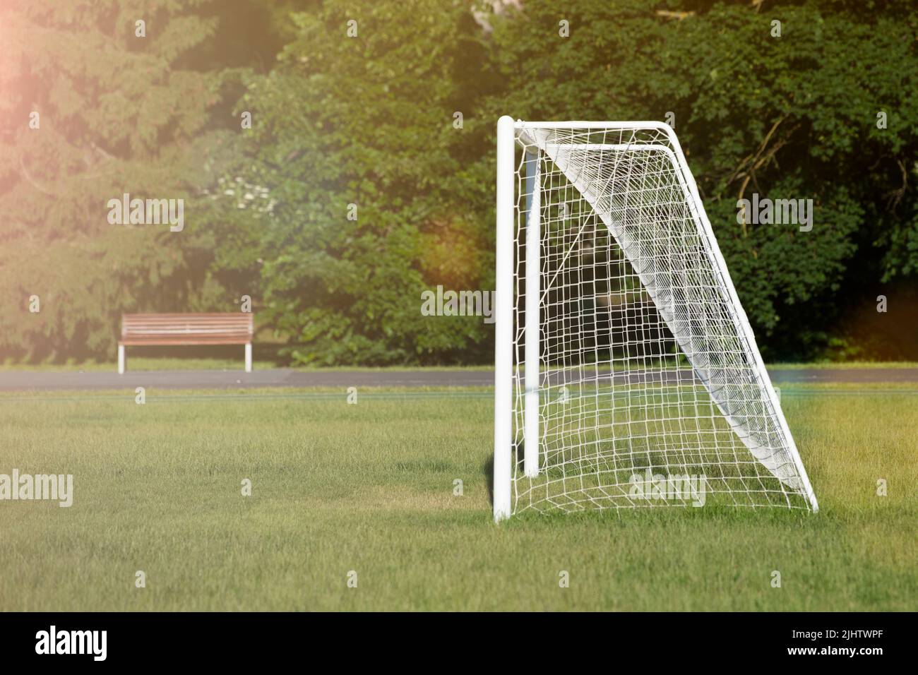 Soccer goal. View of the net on an empty football field. Football goal
