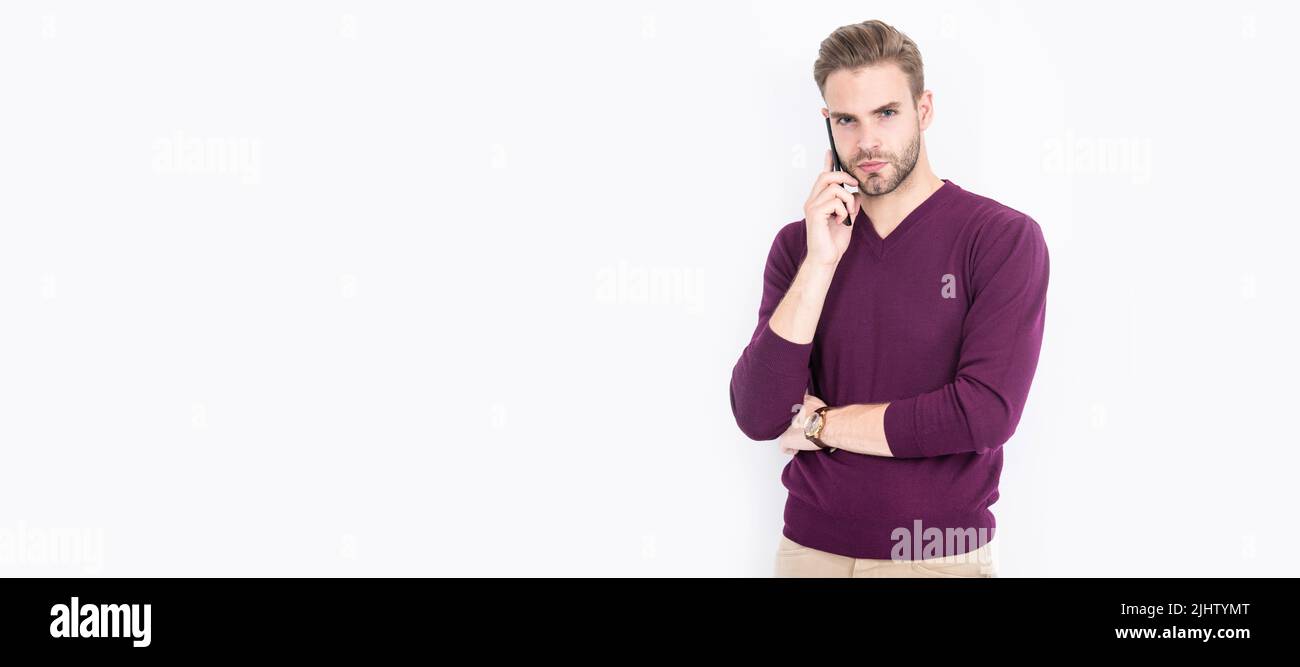 Modern guy in casual fashion style talk on mobile phone isolated on white, communication. Man face portrait, banner with copy space. Stock Photo