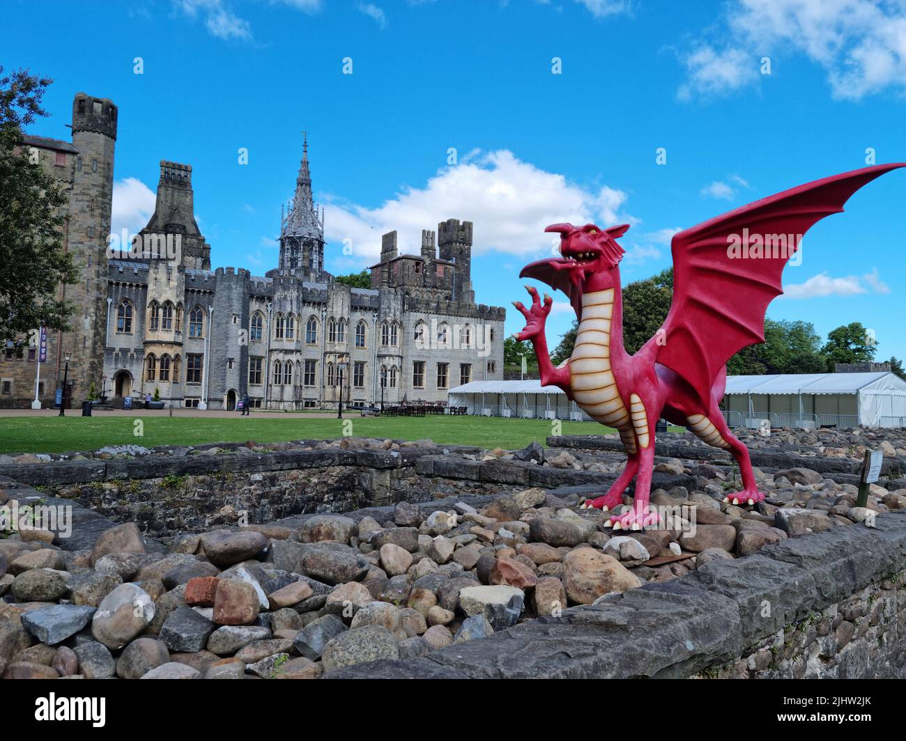 Cardiff, Wales - May 2022: View of Cardiff Castle and the red Welsh Dragon (y Ddraig Goch) Stock Photo