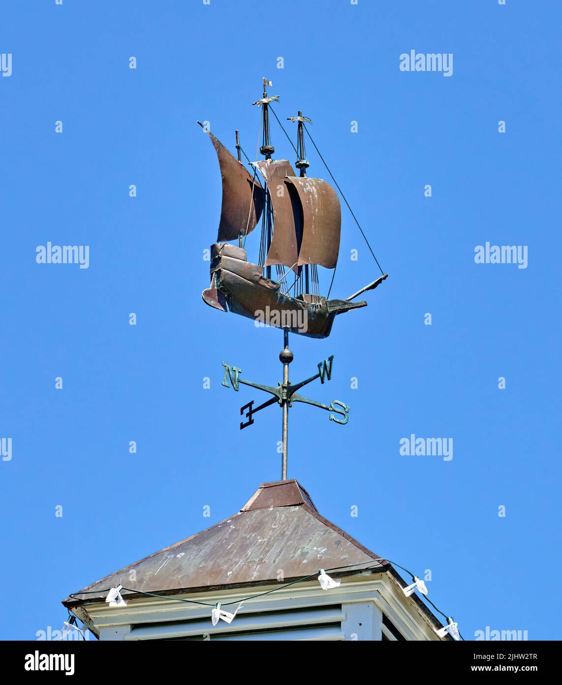 Sail Boat Weather vain in Hyannis.Ma The nautical theme pays homage to the naval history of the city. Stock Photo