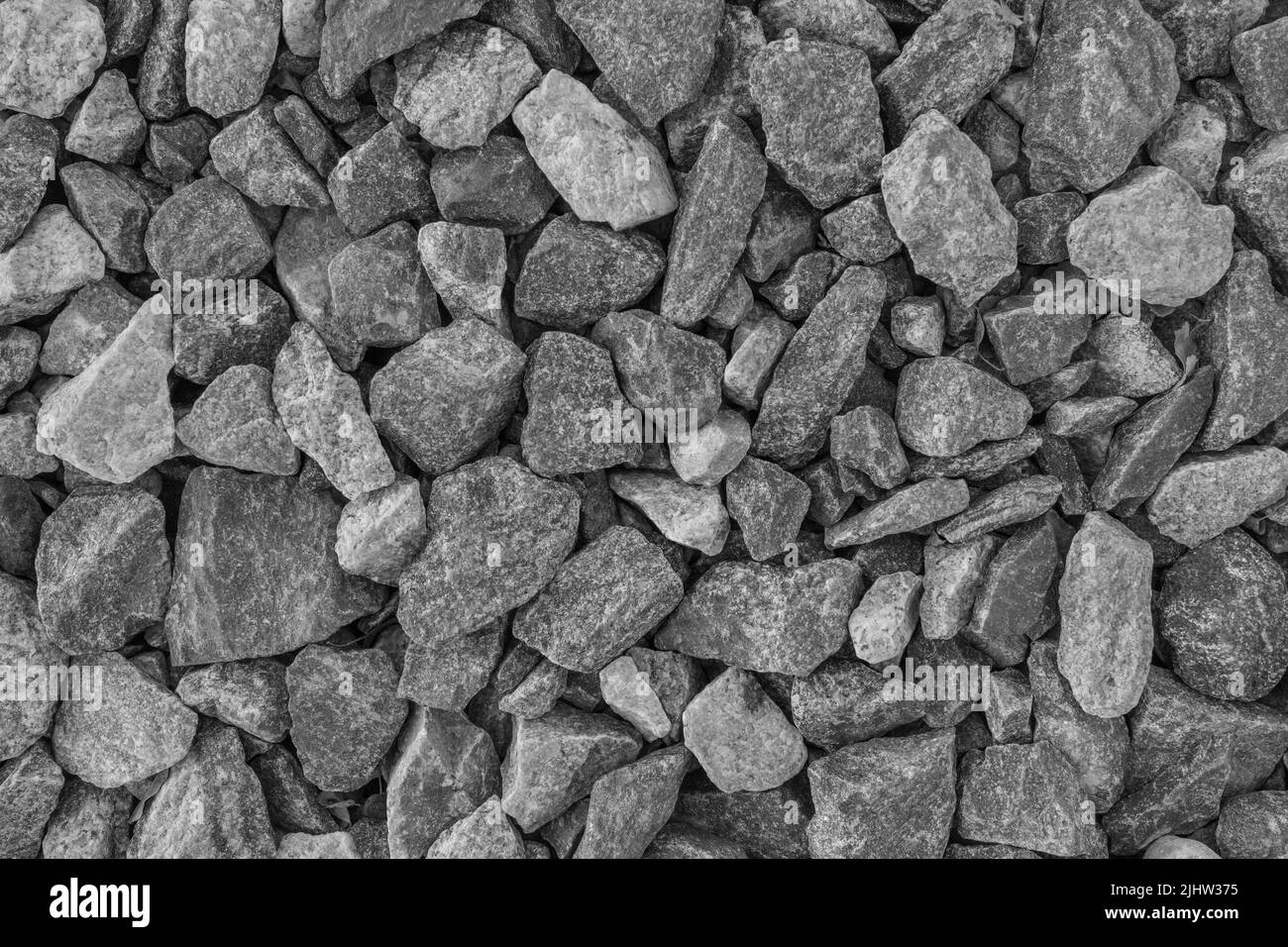 Rubble Hard Industrial Stone Material Texture Background Grey Abstract Pattern. Stock Photo