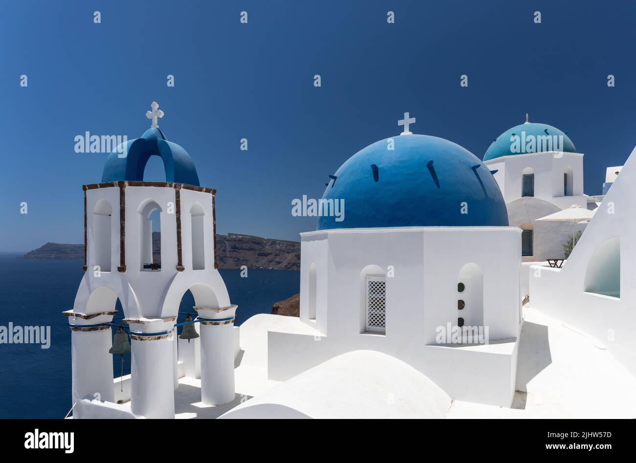 The famous Blue Domes of Oia are situated on the edge of the Caldera in Oia, Santorini, Cyclades islands, Greece, Europe Stock Photo