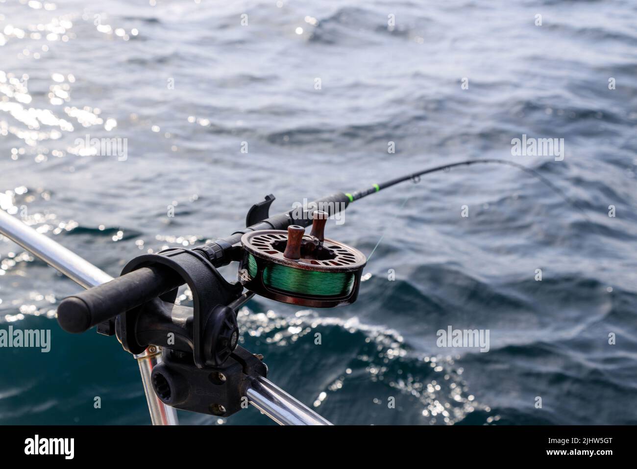 Fishing rod and reel holder on a sport fishing boat in Langara Island